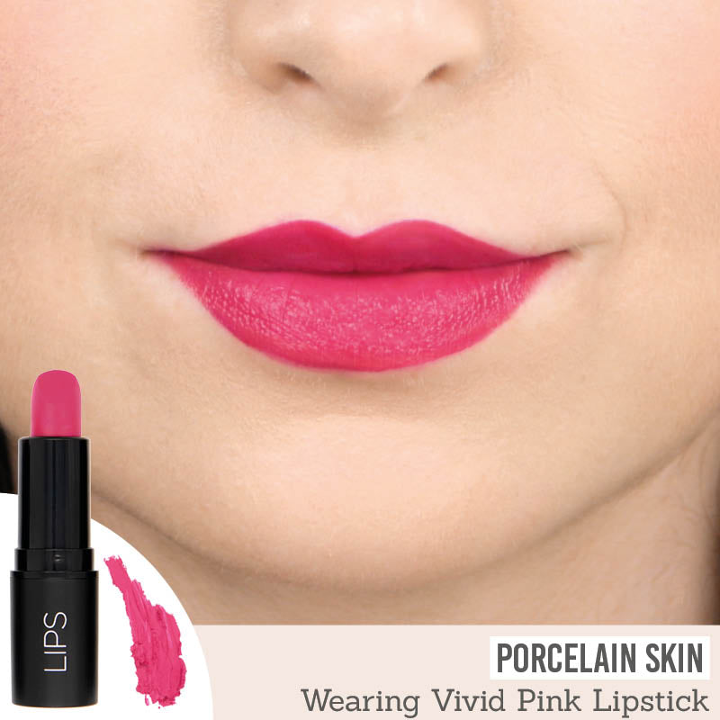 Rageism Beauty Matte Lipstick in Vivid Pink on porcelain skin