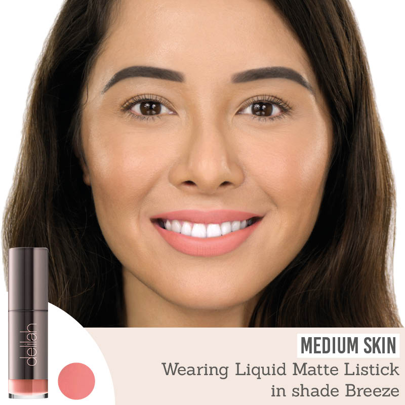 Delilah Liquid Matte Lipstick in shade breeze results on medium skin