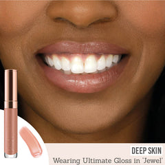 Delilah Ultimate Shine Lip Gloss in shade ‘Jewel’ results on deep skin