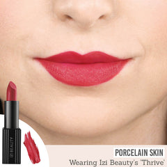 IZI Beauty Empowered Lipstick in Thrive on porcelain skin