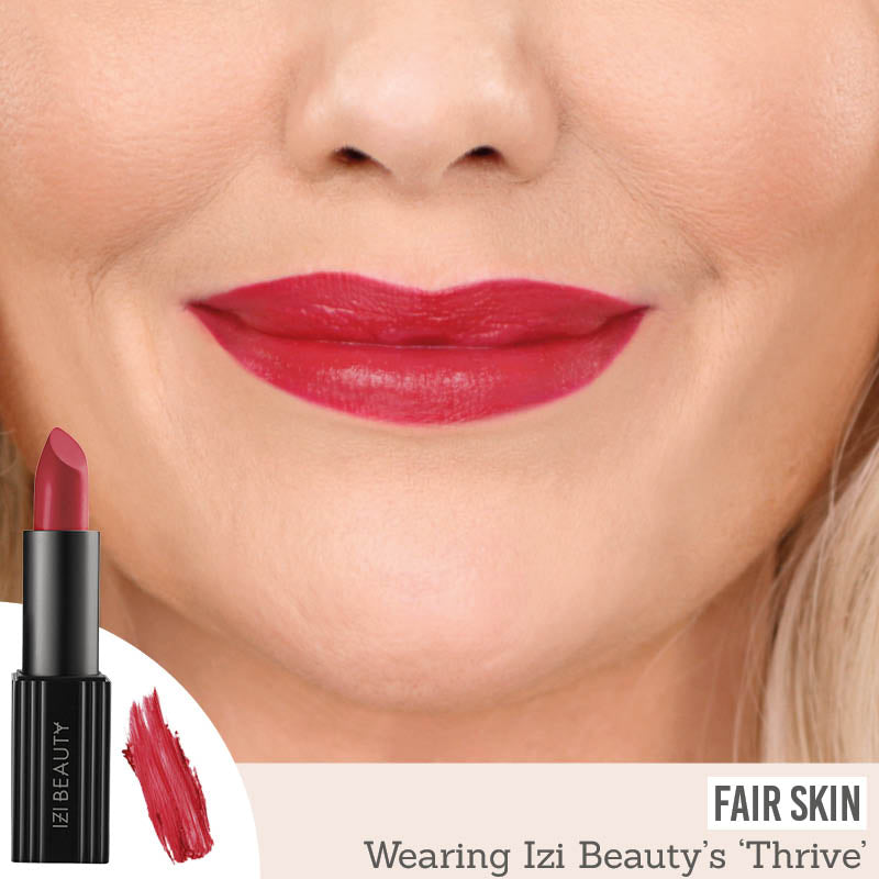 IZI Beauty Empowered Lipstick in Thrive on fair skin