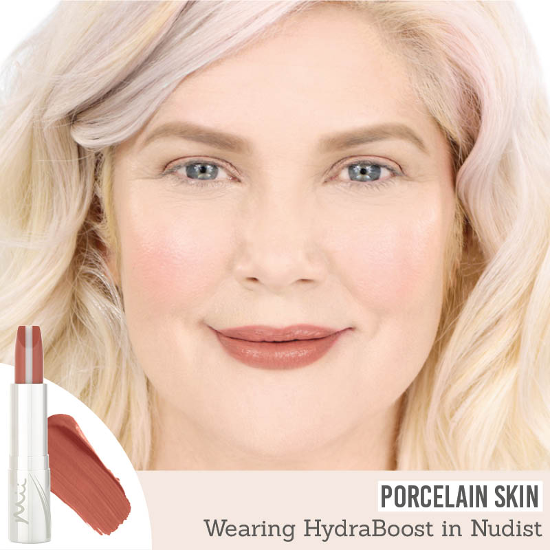 Mii Hydraboost Lip Lover Lipstick in shade 'Nudist' on porcelain skin