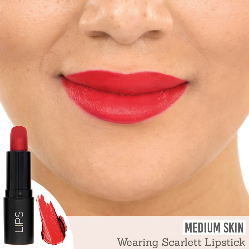 Rageism Beauty Matte Lipstick in Scarlett on medium skin